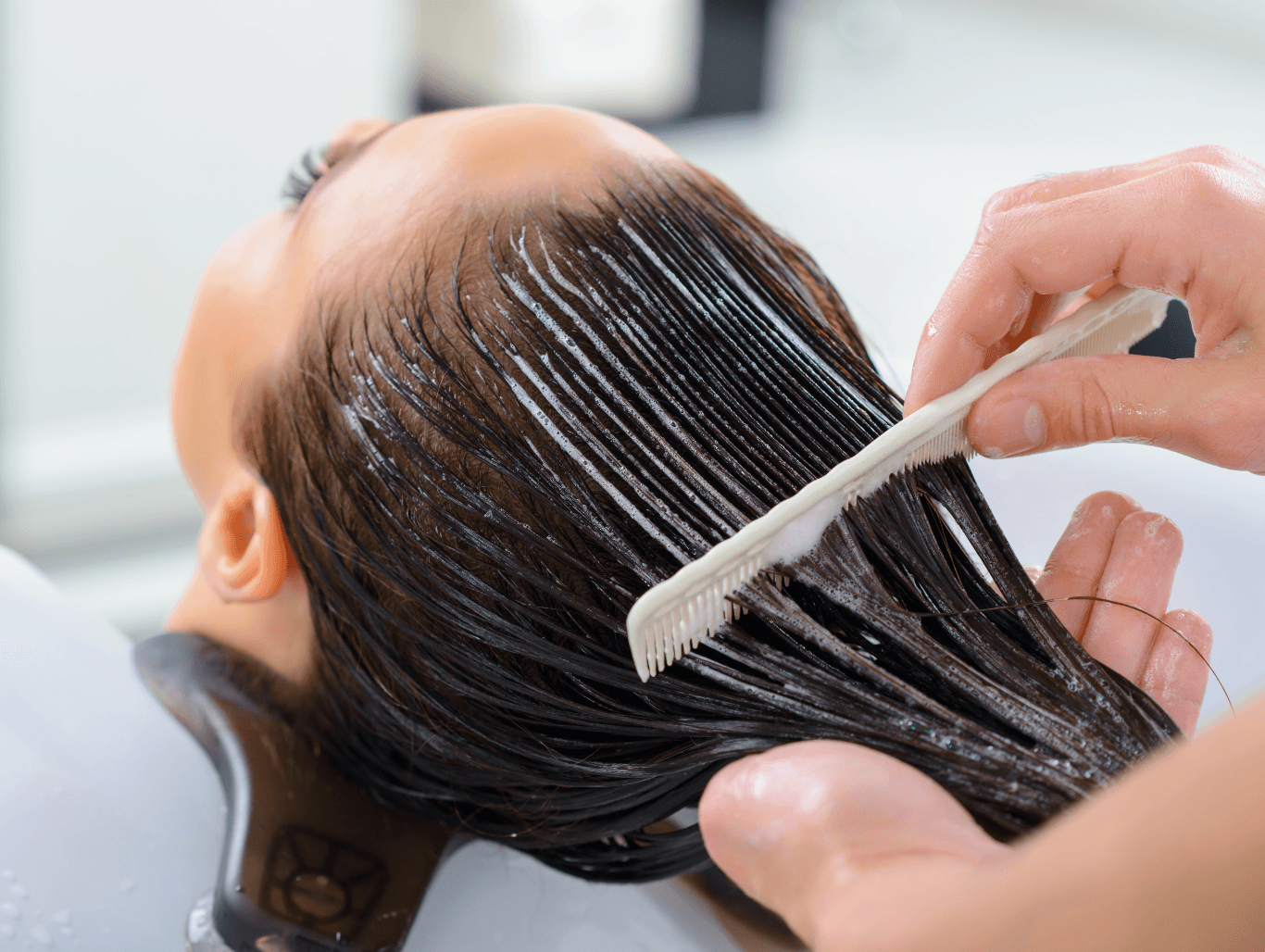 Intense moisturising hair treatment being applied at Michael Todd Hairdressing, East Grinstead — deep conditioning to hydrate and restore dry, damaged hair for clients in West Sussex and surrounding areas