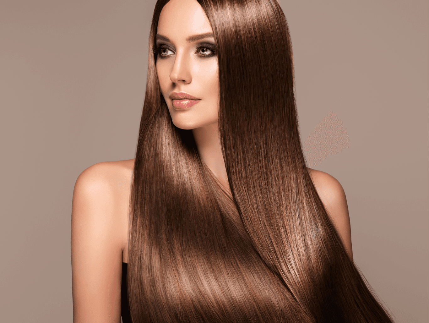 Woman with sleek, glossy hair after a professional keratin treatment at Michael Todd Hairdressing, East Grinstead — smoothing and frizz control across West Sussex