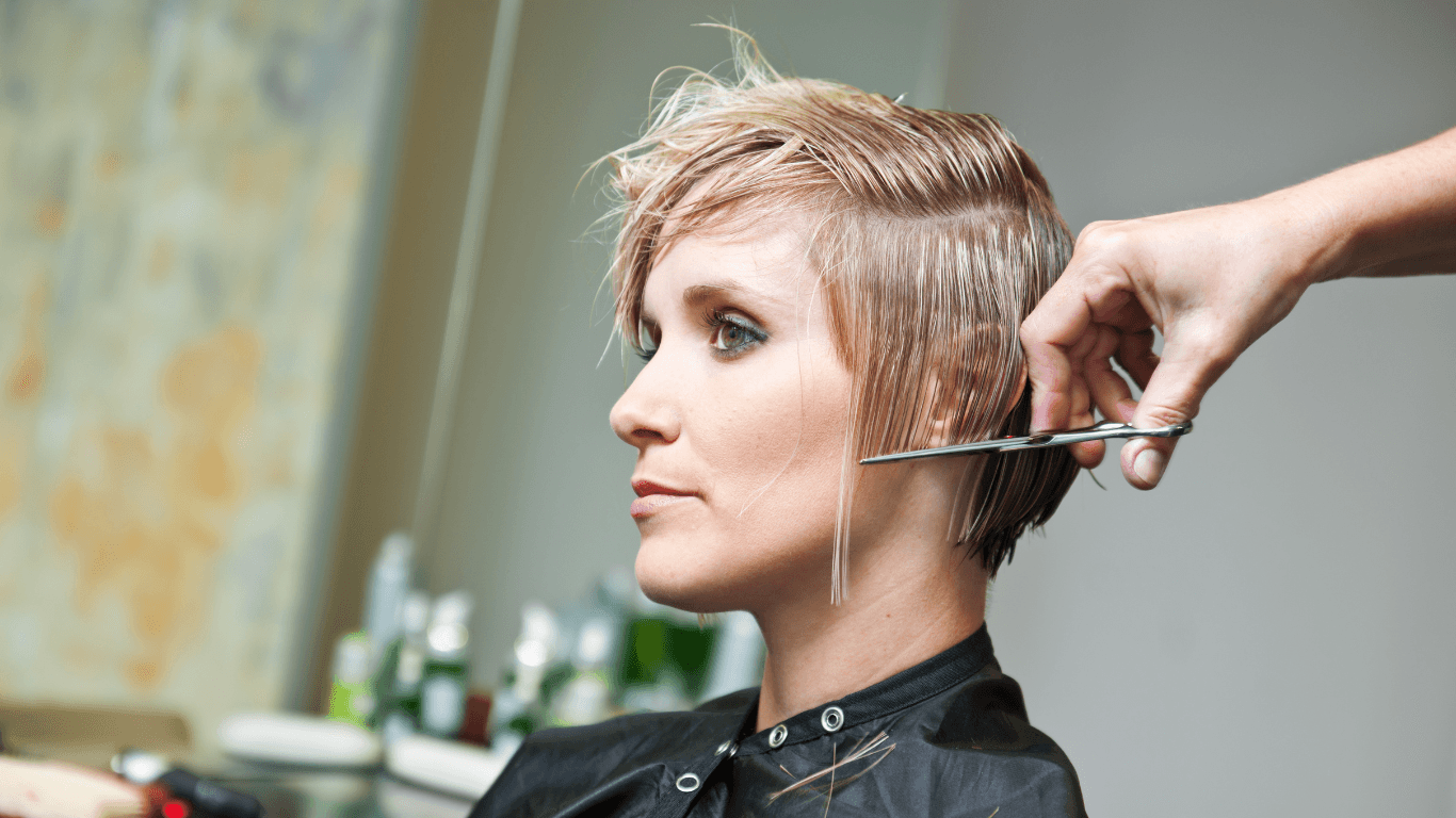 Woman receiving a precision haircut at Michael Todd Hairdressing, East Grinstead — expert ladies’ cut and blowdry service trusted across West Sussex