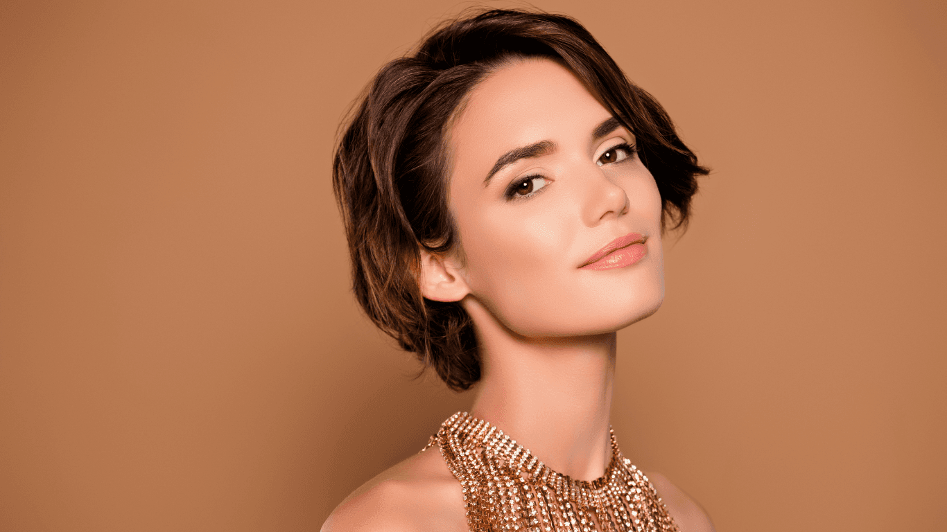 Woman with elegant short haircut and styled blow-dry at Michael Todd Hairdressing, East Grinstead, showcasing expert cutting and styling services in West Sussex
